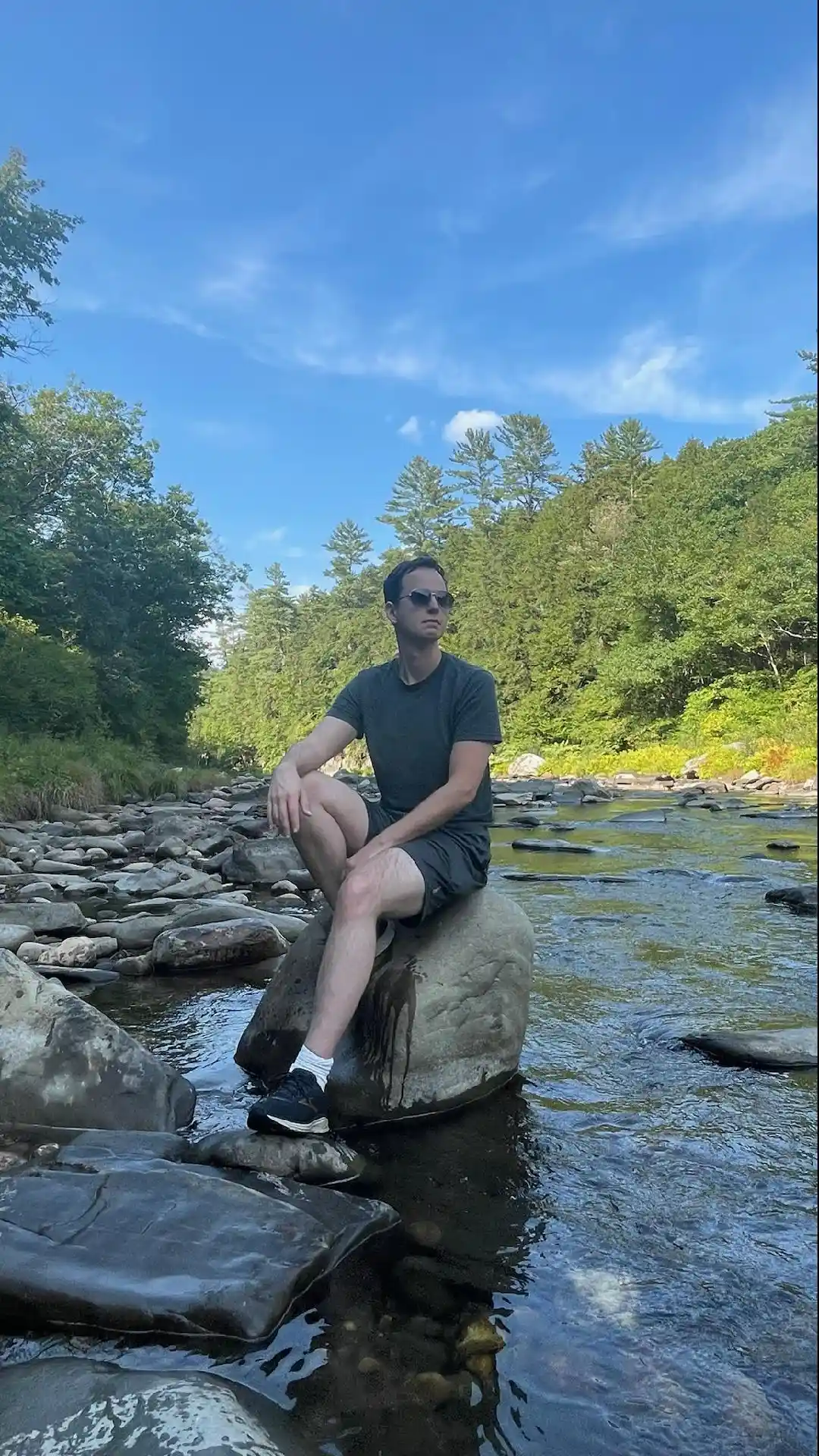 Dave Sorensen posing handsomely on a river rock